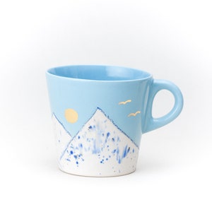 Light Blue Ceramic Cup Coffee Latte cup Drawing Mountain with ceramic crayon GOLD moon and birds Handmade by Iana Kaisheva