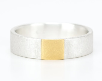 Silver ring with fine gold square