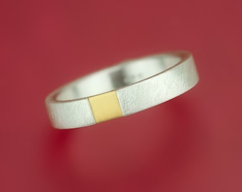 Silver ring with fine gold square