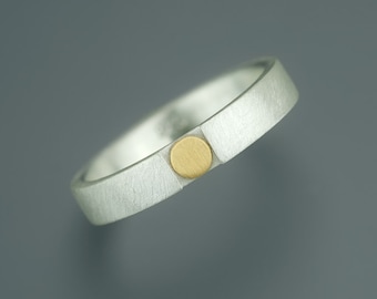 Silver ring with a lowered fine gold dot