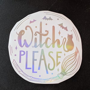 May include: A holographic sticker with the words "Witch Please" in a whimsical font. The design includes bats, stars, a black cat, and a broom, all in a circular arrangement, perfect for Halloween or witch-themed decor.