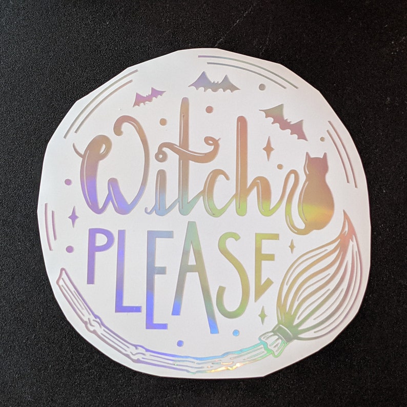 May include: A holographic sticker with the words "Witch Please" in a whimsical font. The design includes bats, stars, a black cat, and a broom, all in a circular arrangement, perfect for Halloween or witch-themed decor.
