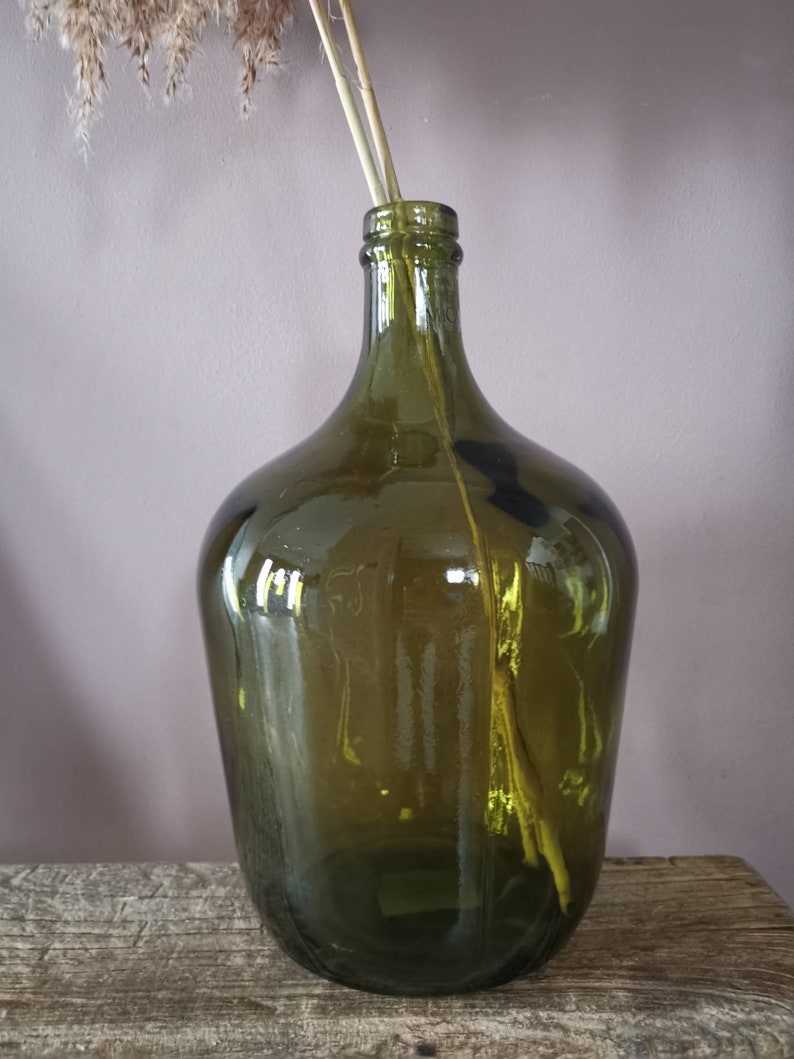 A beautiful tall green bottle neck glass vase Etsy