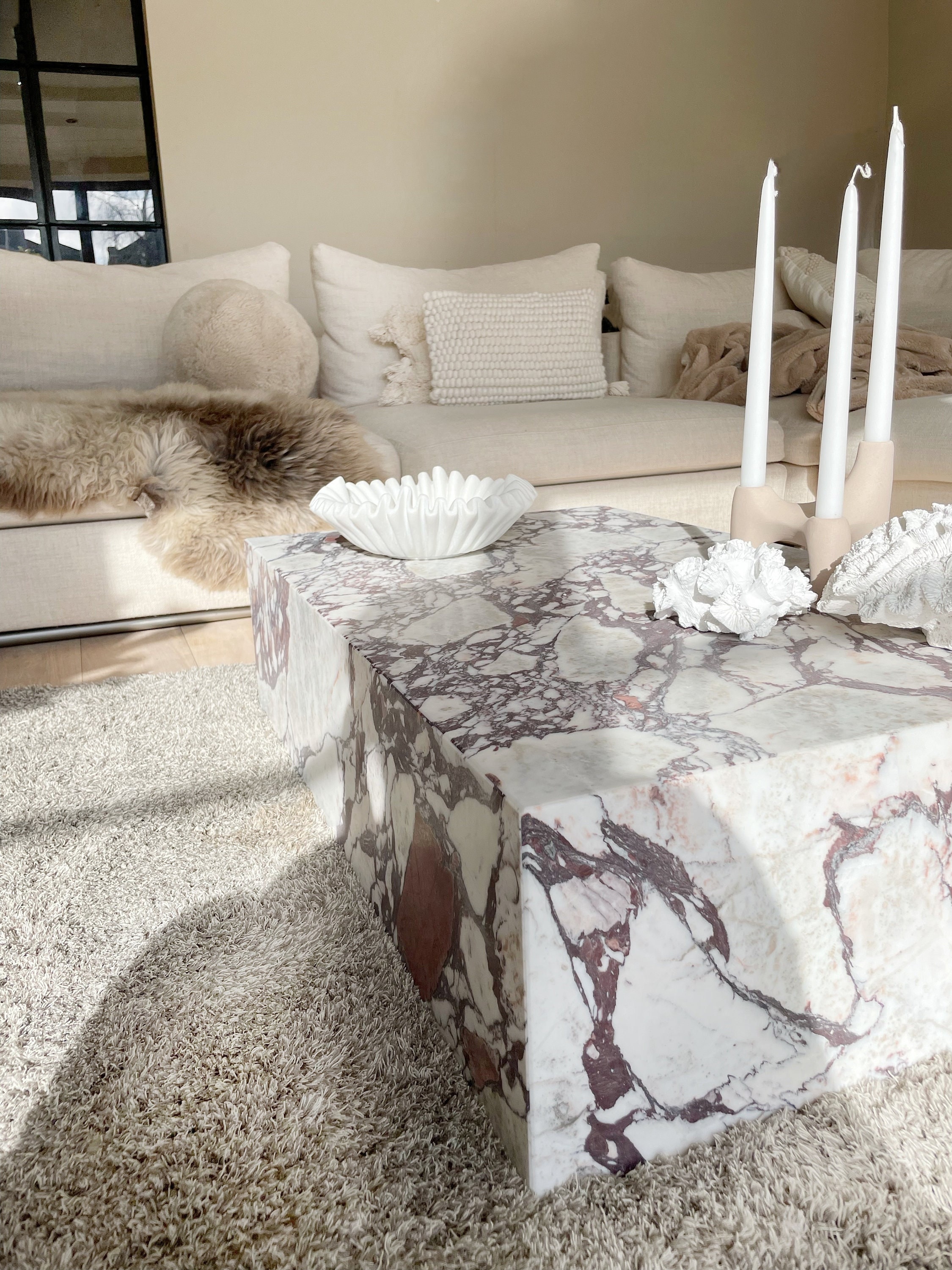 Stone plinth coffee online table