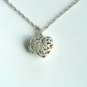 Preowned Sterling Silver Filigree Heart Locket on 18 inch Rope Chain