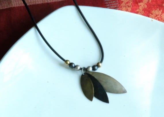 Preowned Sterling Silver Three Leaves Pendant on Leather Cord by  Guillermo Arregui
