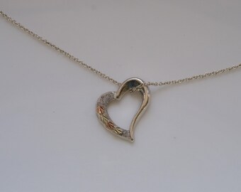 Preowned Sterling Silver and 10K Gold Accented Heart Slide Pendant on 16 inch Chain