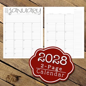 May include: A 2-page calendar for January 2028, with a red and white label that reads "2028 2-Page Calendar." The calendar pages are white with gray lines and numbers. The background is a wooden surface.