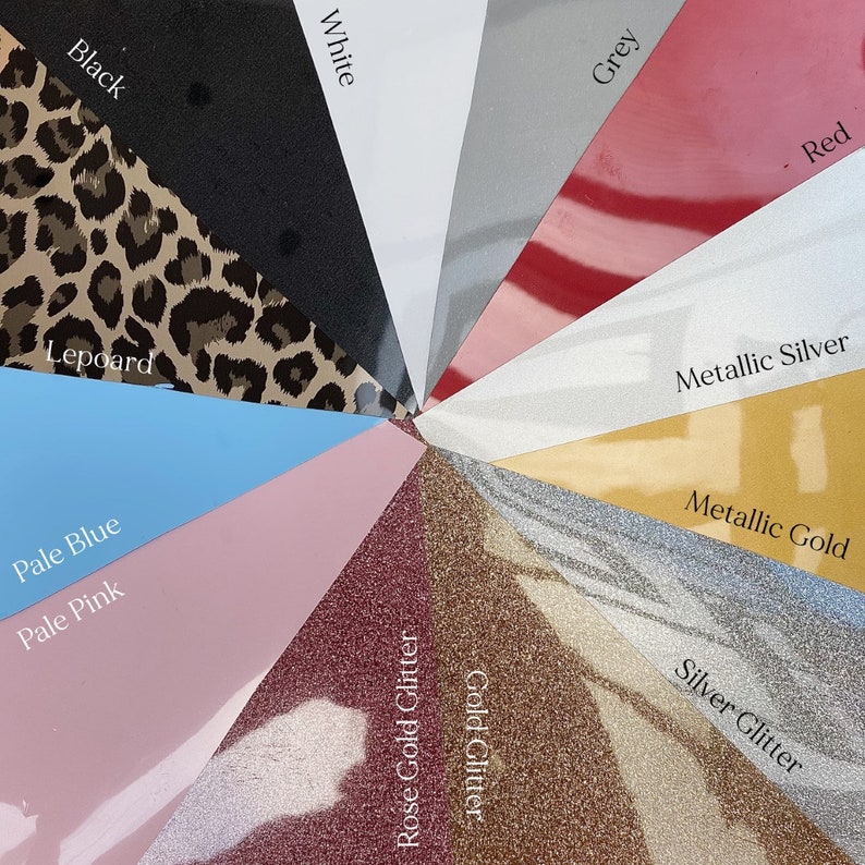 May include: A selection of vinyl colours and textures for crafting projects. The colours include black, white, grey, red, metallic silver, metallic gold, pale blue, pale pink, leopard print, rose gold glitter and silver glitter.