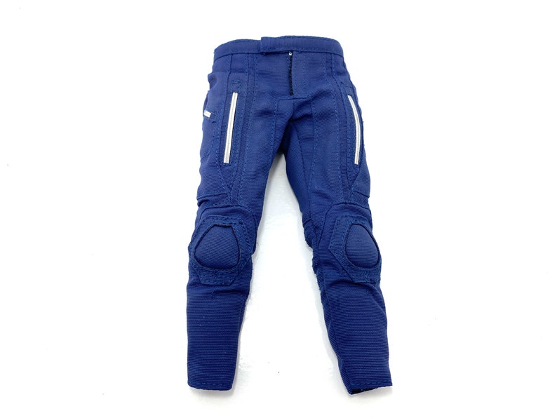 May include: Blue trousers with white accents and knee pads.