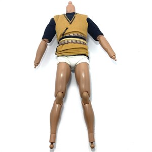 May include: An action figure with articulated limbs, dressed in a brown vest with a black undershirt and white underwear. The figure has a brown belt with a gold buckle.