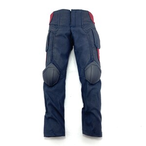 May include: Black tactical trousers with red accents and knee pads.