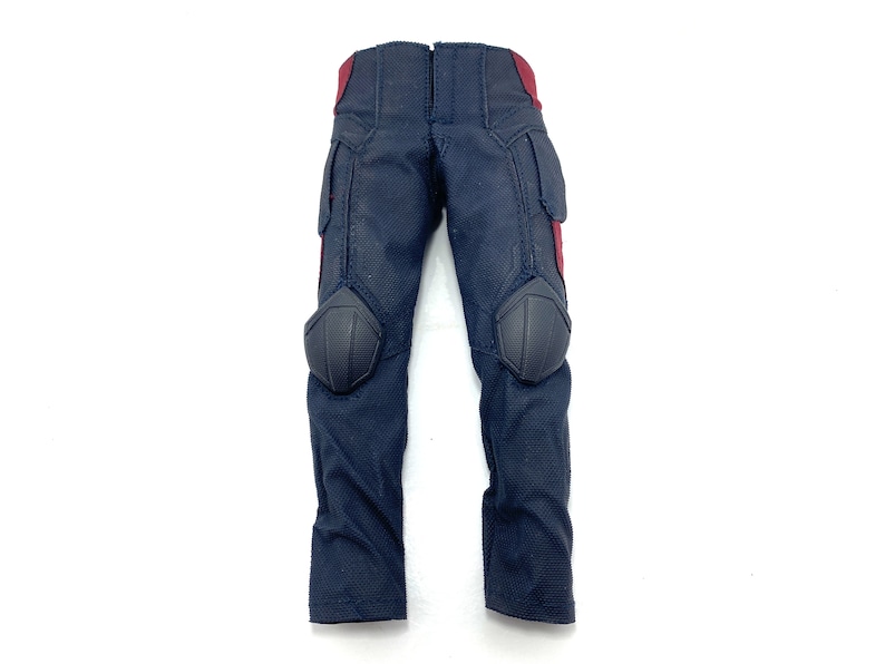 May include: Black tactical trousers with red accents and knee pads.