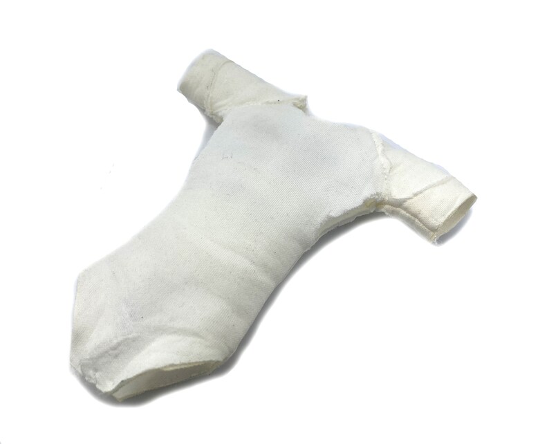 May include: A white cotton bodysuit with short sleeves. The bodysuit is lying flat on a white background.
