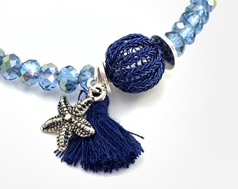 elastic blue shimmering crystal bead bracelet with double copper wire crochet navy blue mini bubble and tassel