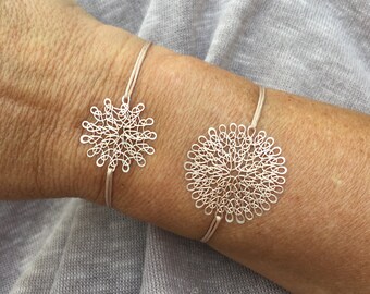 bracelet with finger knitted rose gold colored copper wire mandala element
