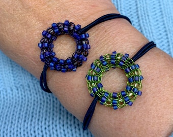 elastic bracelet with wire crochet donut element of colored copper wire with glass beads - color choice