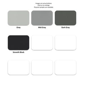 May include: A grid of nine rectangular color swatches featuring various shades. The top row displays gray, mid gray, and dark gray. The second row shows smooth black followed by two white swatches. The bottom row contains three white swatches.