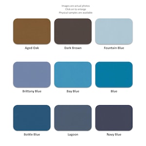 May include: A grid of nine rectangular color swatches labeled Aged Oak, Dark Brown, Fountain Blue, Brittany Blue, Bay Blue, Blue, Bottle Blue, Lagoon, and Navy Blue. Each swatch displays a solid, flat color with rounded corners on a white background.