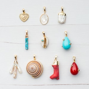 Gold plated charms for necklaces · Pendants · Cowrie charm · Coral branch · Baroque pearl · Keshi pearl · Turquoise · Conch shell charms