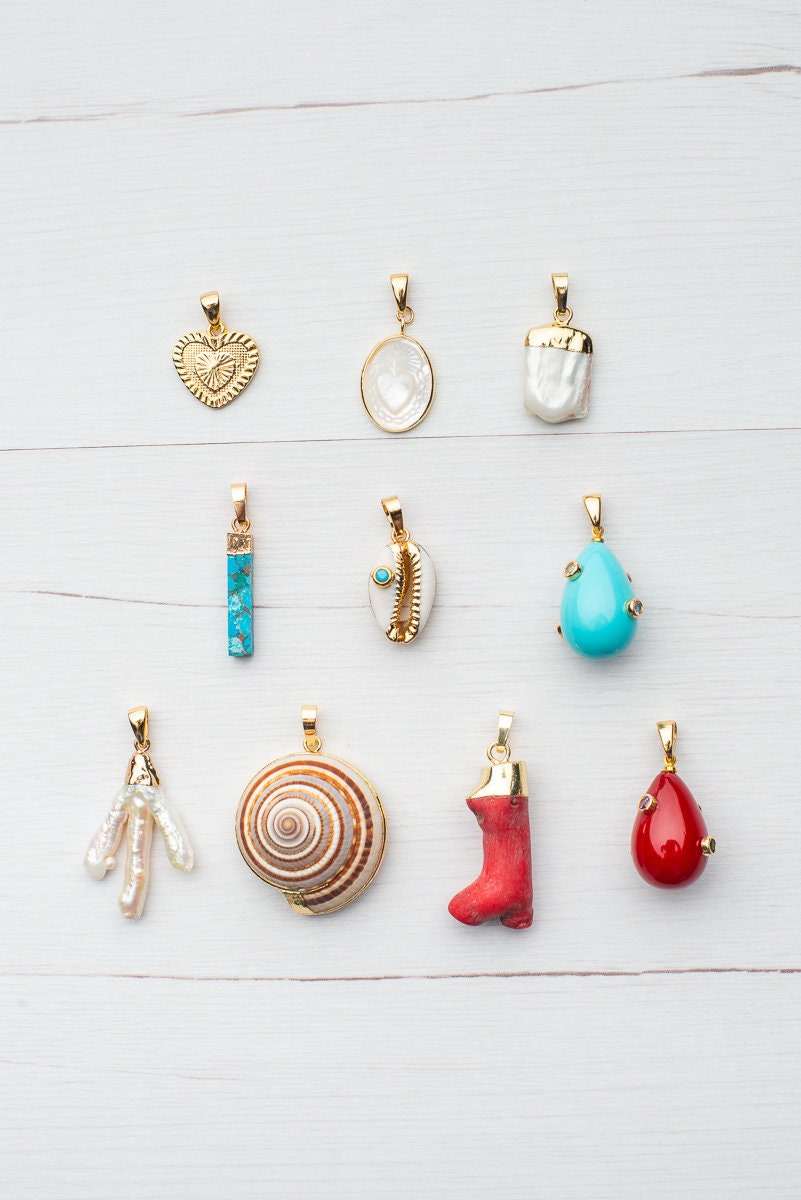 Gold plated charms for necklaces · Pendants · Cowrie charm · Coral 