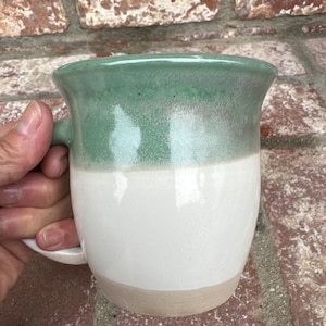 White and green coffee mugs