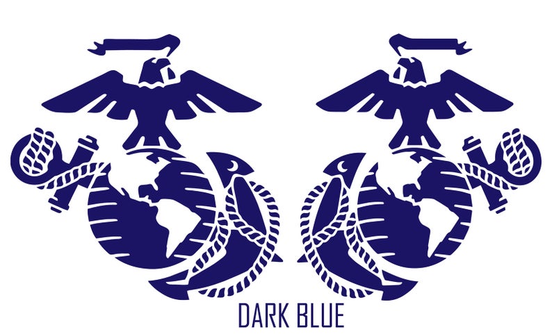 May include: A dark blue emblem featuring a globe, anchor, and eagle. The globe is central with the continents of North and South America visible. The anchor is wrapped in rope and the eagle is perched above the globe with its wings outstretched.