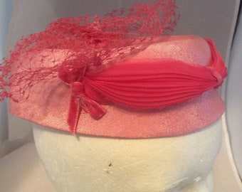 Pink band with pink mesh hat