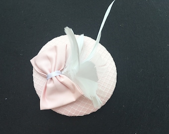 pink fascinator, net, bow, feather rosette, elegant, festive, bride,