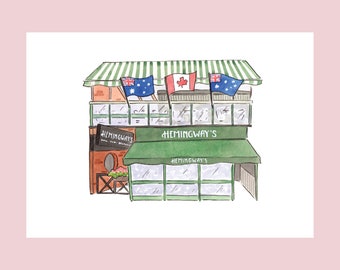 Puede incluir: Una ilustración de acuarela de un edificio verde con un letrero que dice "Hemingway's". El edificio tiene un toldo verde y dos ventanas. Hay tres banderas colgando del edificio: una bandera australiana, una bandera canadiense y otra bandera australiana.
