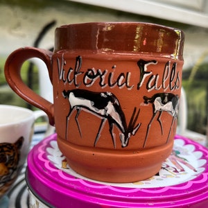Victoria Falls mug with deer images. A lovely stoneware mug to add to your collection