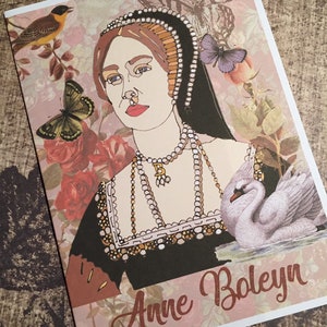 May include: A vintage-style illustration of Anne Boleyn, the second wife of King Henry VIII. The image features a portrait of Anne Boleyn with a pearl necklace and a swan. The background is a pink floral pattern with butterflies.