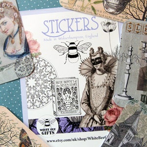 May include: A collection of vintage-style stickers featuring a bee, a stained glass window, a book with the title "Blue Bonnet of the Seven Stars", a woman in a mask and a dress, and a candlestick. The stickers are made in Wolverhampton, England and are available from White Bee Gifts on Etsy.