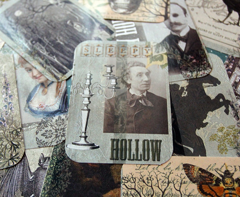 May include: A vintage style card with a candelabra and the words "Sleepy Hollow" printed on it. The card is decorated with a floral pattern and has a distressed look.