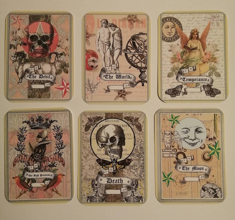 May include: Six tarot cards with a vintage aesthetic. The cards feature illustrations of a skull, a goat, a globe, a woman with wings, a skull with a crown, and a moon with a face. The cards are labeled "The Devil", "The World", "Temperance", "Death", "The High Priestess", and "The Moon".