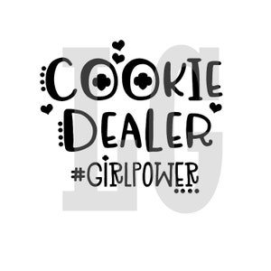 May include: Black and white graphic text design with the words "Cookie Dealer" and "#Girlpower".