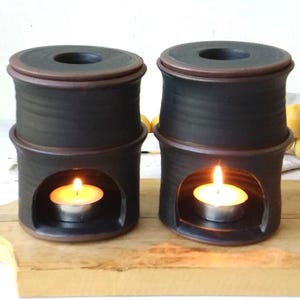 Handgemaakte zwarte keramische olieverspreider, etherische-oliebrander voor thuis of in de spa