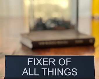 Fixer Of All Things funny office decor sign, funny office desk accessories & desk signs for work by Griffco Supply