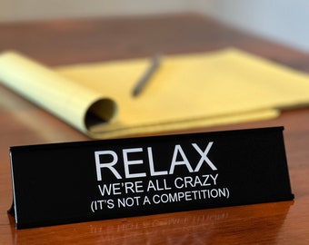 Relax We're All Crazy. It's Not A Competition - Lotsa Laughs Funny Desk Plate Office Decor by Griffco Supply - Affordable, Fun Office Gifts