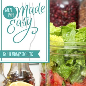 May include: A teal and white graphic with the text "Meal Prep Made Easy" and "By The Domestic Geek". The graphic is overlaid on a photo of a mason jar filled with salad ingredients.