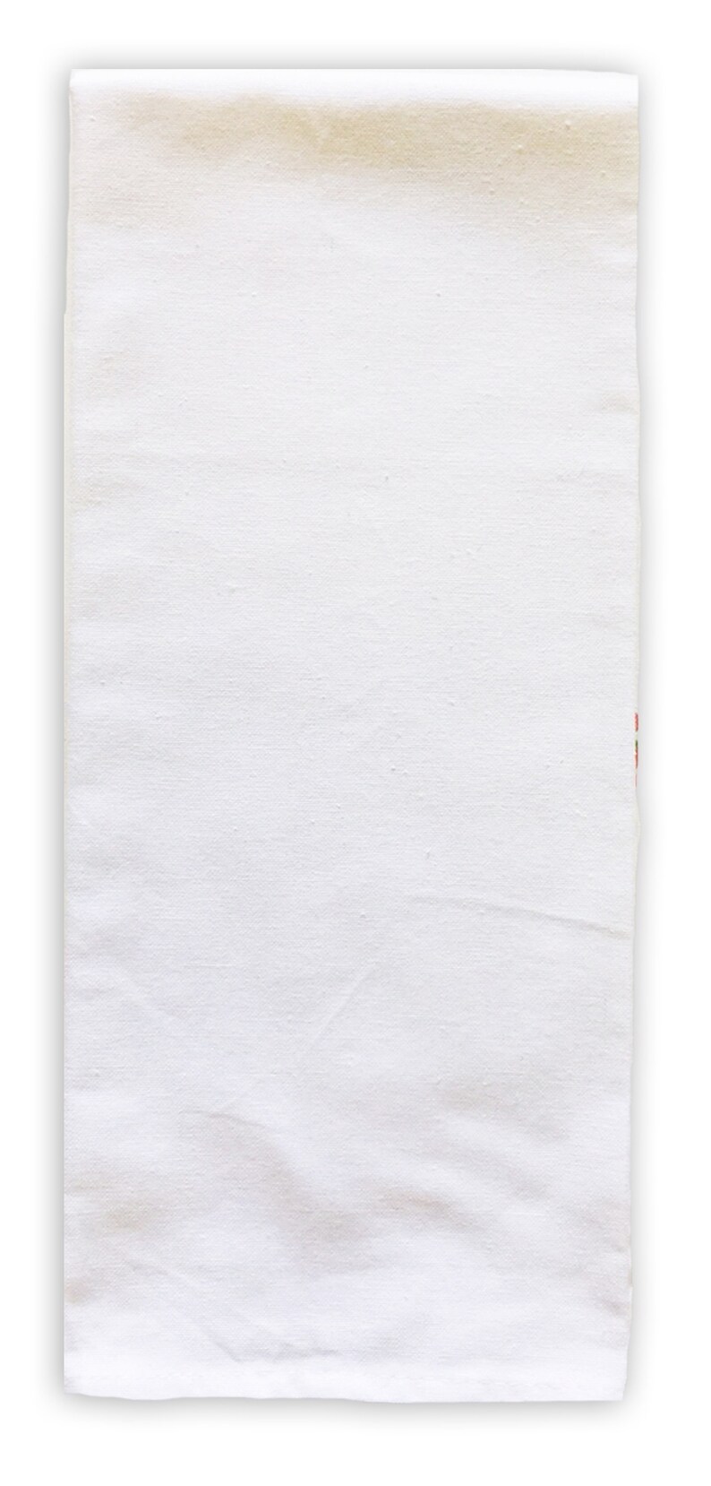 May include: A plain white cotton tea towel with a subtle texture. The towel is folded in half and has a slight crease down the middle.