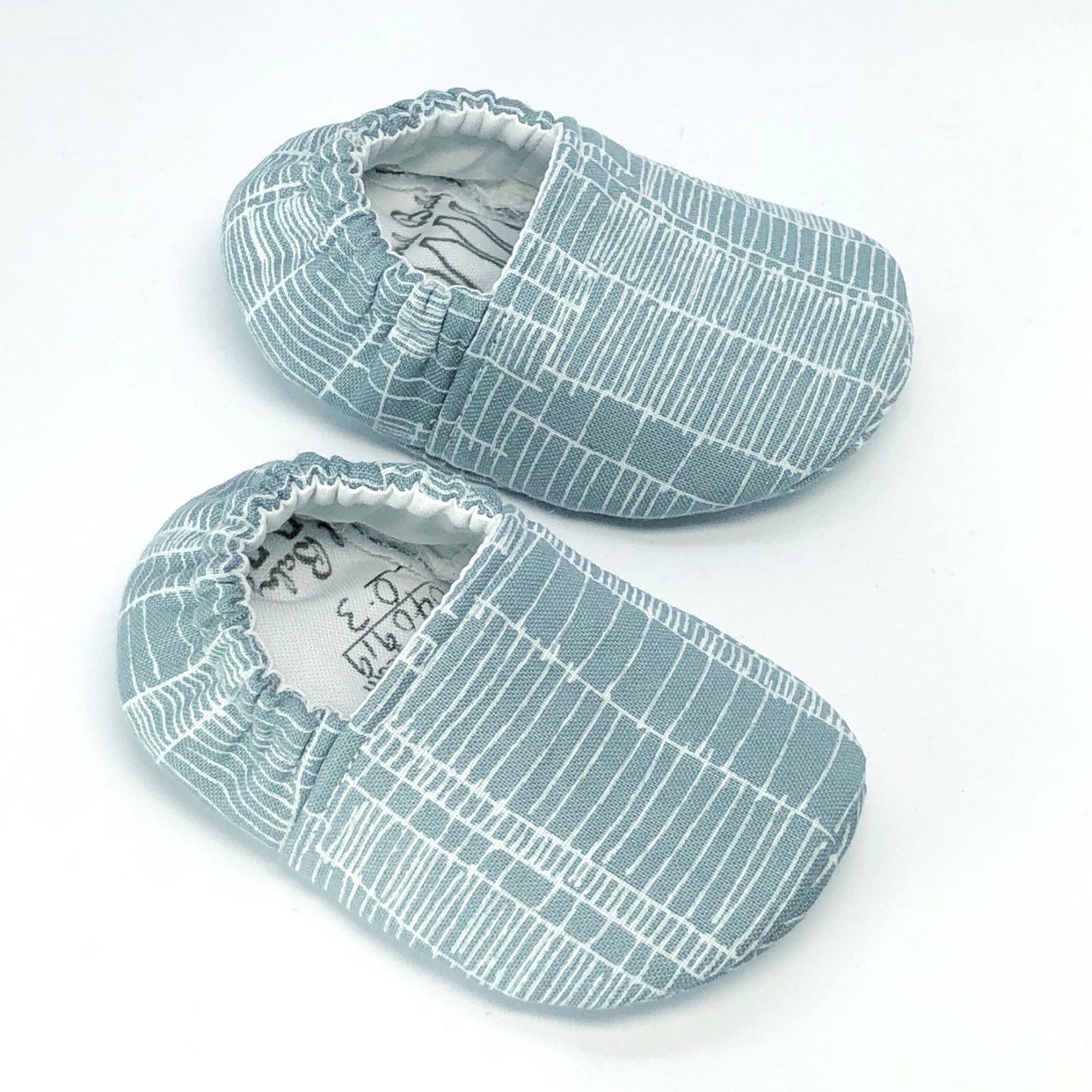 gray baby moccasins
