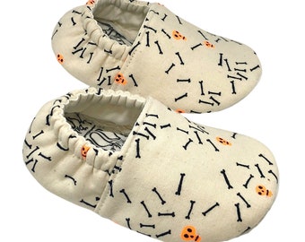 Spooky Halloween Moccasins with Neon Orange Skulls & Black Bones Design, Perfect for New Walkers or Newborns