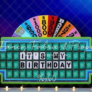 May include: A green and blue game board with the phrase "IT'S MY BIRTHDAY" on it. The board is surrounded by a colorful wheel with dollar amounts and the word "BANKRUPT".