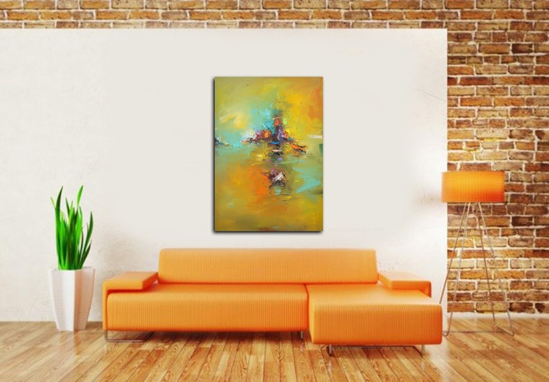 May include: Abstract painting with a yellow, green and blue colour scheme. The painting features a central cluster of colourful shapes and a reflection in the water below.