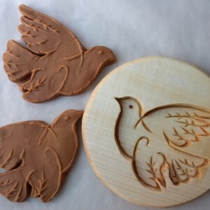 Gingerbread shape Dove of Peace based on the graphics of Pablo Picasso
