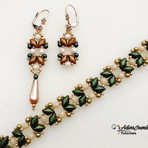 May include: A set of gold, green, and white beaded earrings and a matching bracelet. The earrings are dangle style and the bracelet is a delicate chain with a repeating pattern.