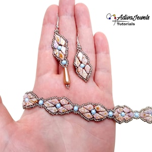 May include: A set of beaded jewelry featuring a bracelet and earrings. The jewelry is made with brown, pink, and blue beads in a geometric pattern. The earrings are drop earrings with a pearlescent bead at the bottom.