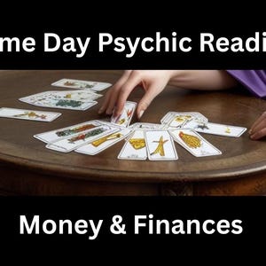 May include: A round, wooden table with tarot cards laid out. The text "Same Day Psychic Reading" and "Money & Finances" are displayed in white text on a black background. A hand is reaching for a card.