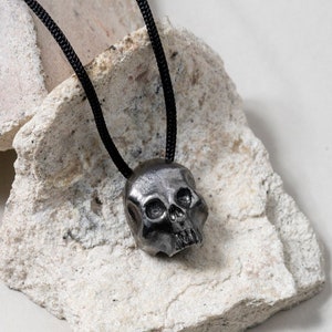 Brutalist skull pendant necklace for men and women in oxidized sterling silver